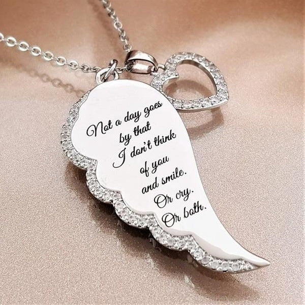 "Not a day goes by" Crystal Pav'e Angel Wings Necklace in Silver